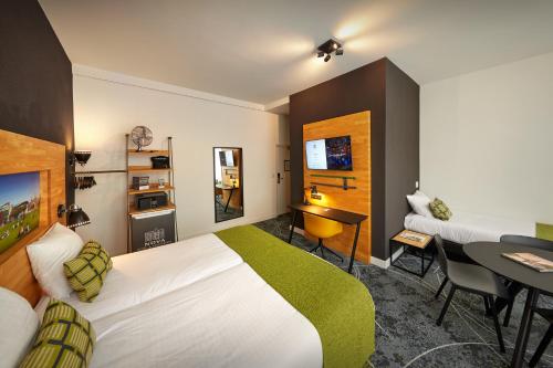 Habitación Triple Confort del hotel Nova Hotel and Apartments. Foto 2