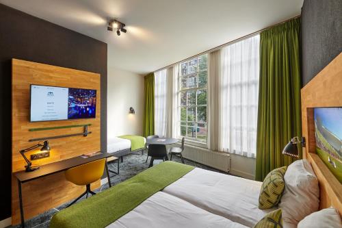 Habitación Triple Confort del hotel Nova Hotel and Apartments. Foto 5