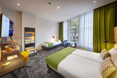 Habitación Triple Confort del hotel Nova Hotel and Apartments. Foto 6