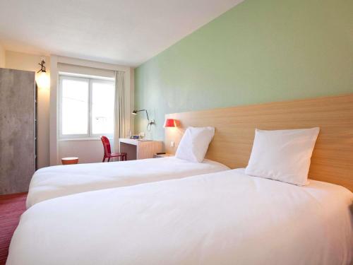 Habitación estándar con dos camas individuales del hotel Ibis Styles Le Puy En Velay