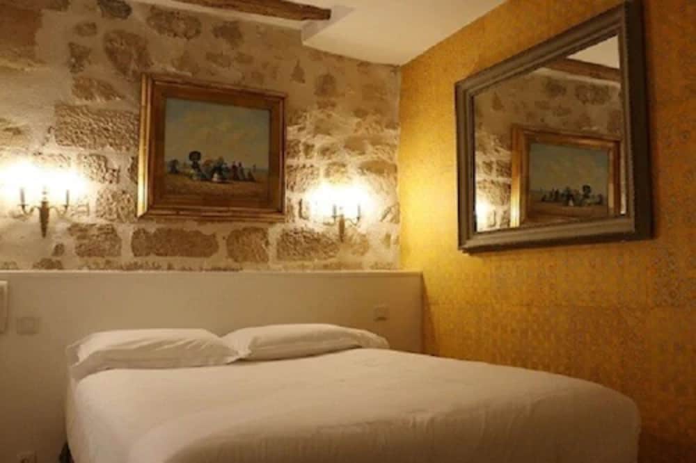 Habitación triple del hotel Du Lys