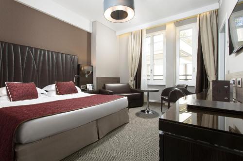 Habitación Triple Deluxe del hotel Artemide