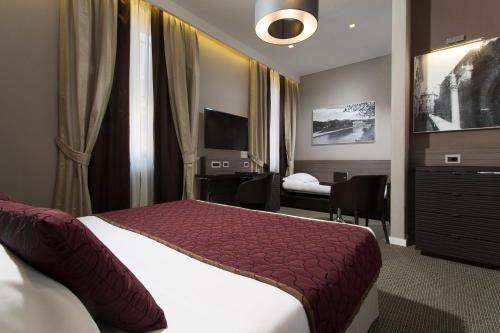 Habitación Triple Deluxe del hotel Artemide. Foto 4