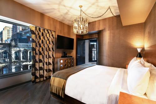 Estudio - Cama extragrande del hotel Roxy New York. Foto 3
