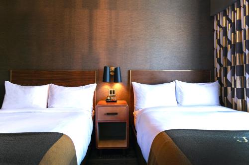 Habitación Doble Deluxe - 2 camas dobles del hotel Roxy New York. Foto 2