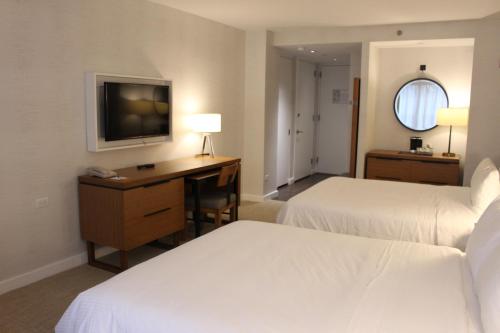 Habitación Doble con 2 camas grandes del hotel Club Wyndham Midtown 45. Foto 2