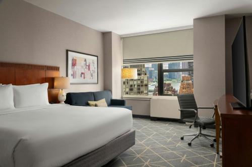 Habitación con cama extragrande. del hotel Courtyard New York Manhattan/Midtown East. Foto 5