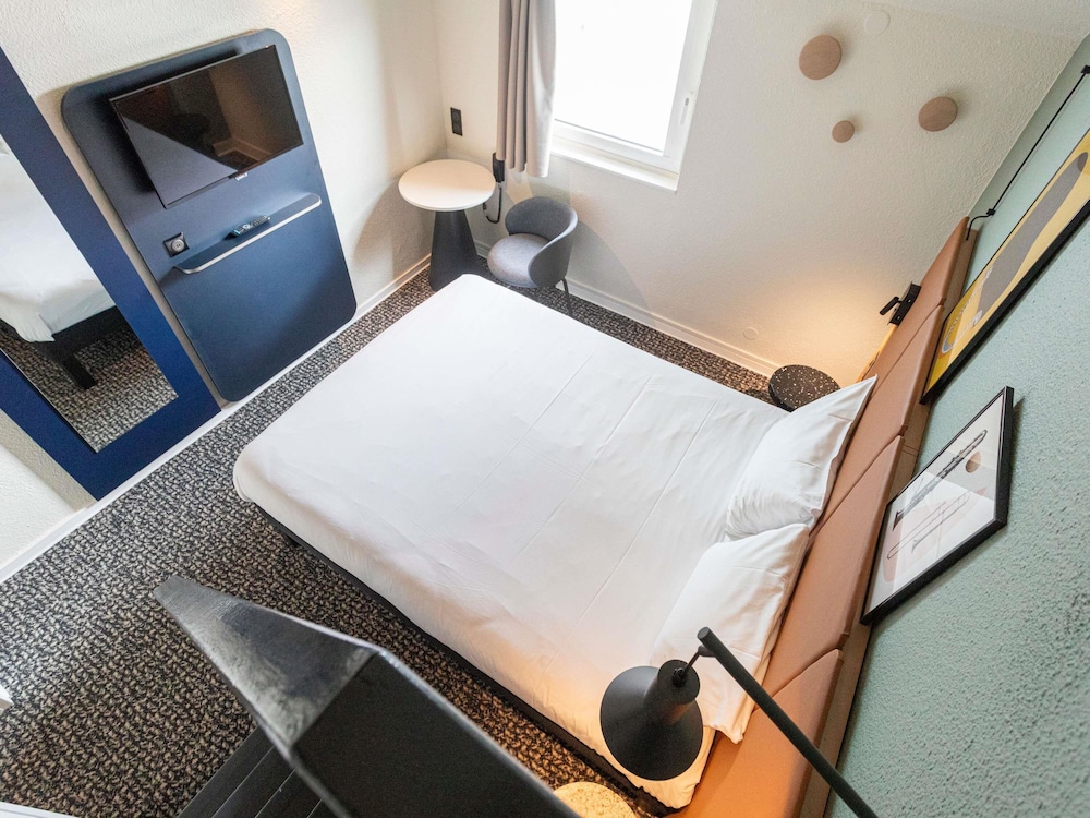 Habitación estándar con 1 cama doble, camas individuales y vistas al océano del hotel Ibis Granville Port De Plaisance