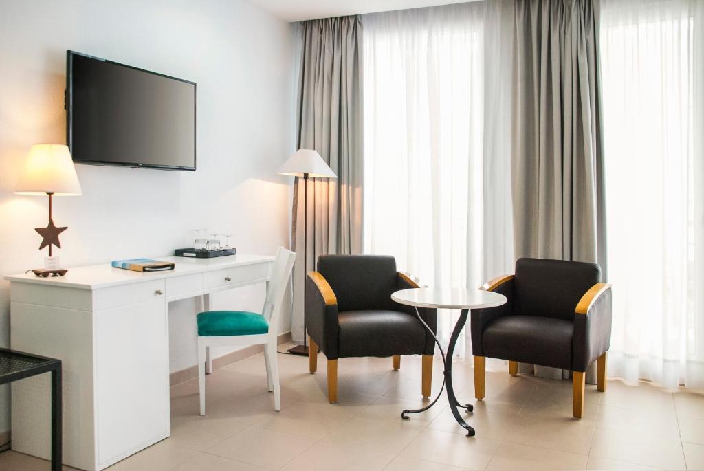 Habitación familiar del hotel Fuerte Conil - Resort. Foto 1