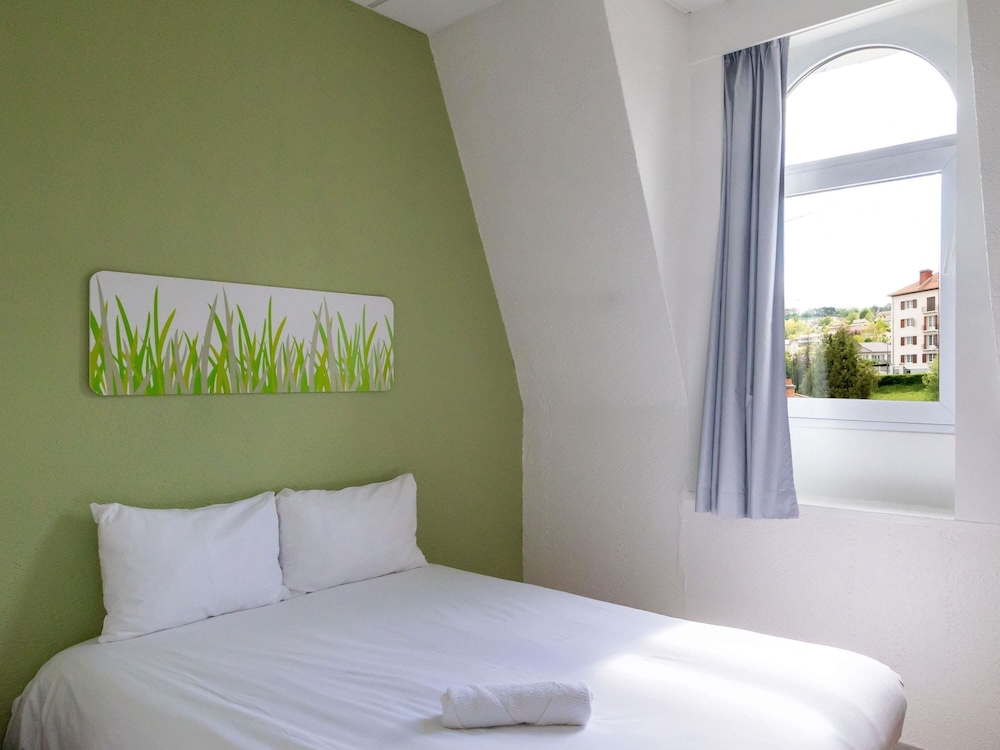 Habitación INDIVIDUAL con una cama individual del hotel Ibis Budget Le Puy En Velay
