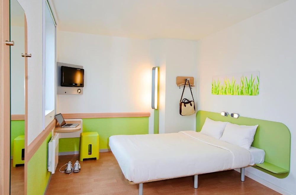 Habitación INDIVIDUAL con una cama individual del hotel Ibis Budget Le Puy En Velay. Foto 1