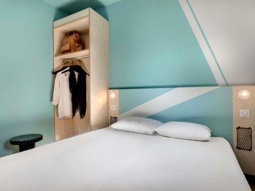 Habitación Estándar con 1 cama doble del hotel Ibis Budget Montpellier Millènaire. Foto 7
