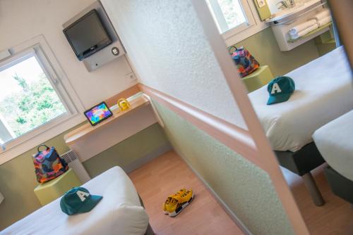 Habitación Doble Estándar - 2 camas del hotel Ibis Budget Aix Le Canet. Foto 2