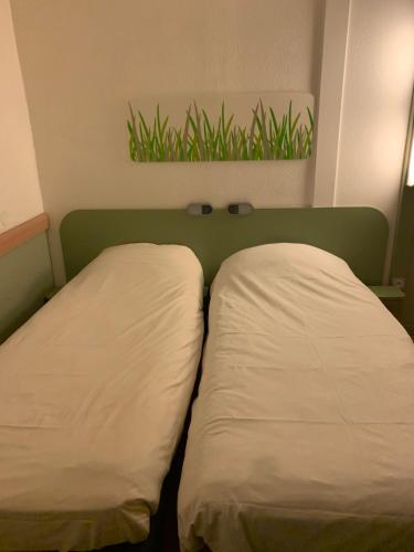 Habitación Doble - 2 camas del hotel Ibis Budget Chambéry Sud Challes Les Eaux