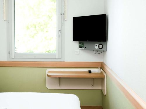 TWIN - Habitación con camas individuales del hotel Ibis Budget Saint-omer Centre. Foto 1
