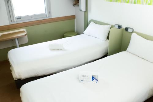 TWIN - Habitación con camas individuales del hotel Ibis Budget Saint-omer Centre. Foto 7