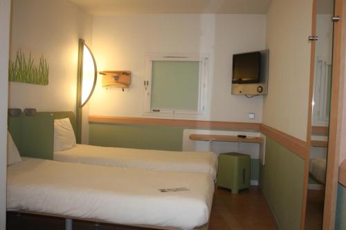 HABITACIÓN DOBLE CON CAMAS INDIVIDUALES del hotel Ibis Budget Issoire