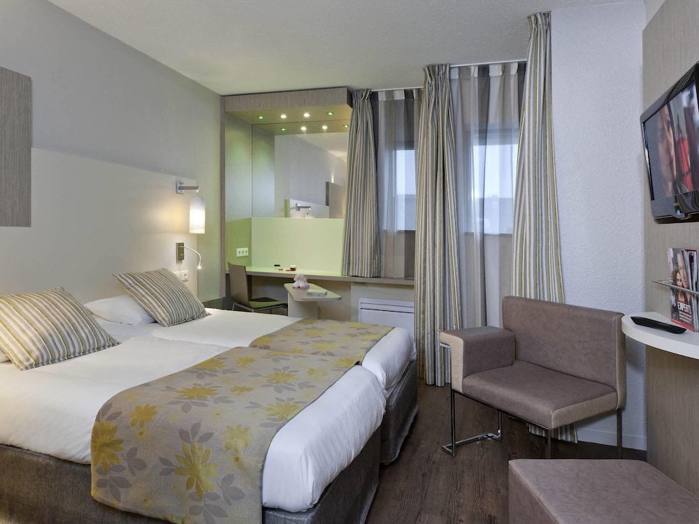Habitación con camas individuales del hotel Ibis Styles Melun