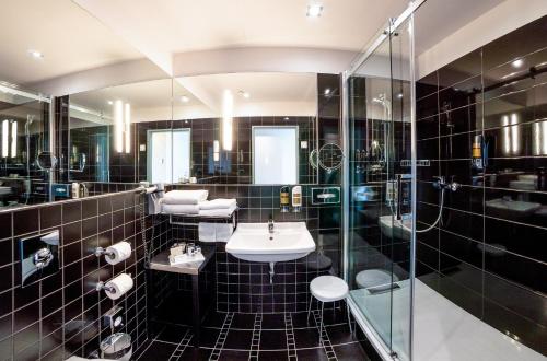 Habitación Doble Deluxe del hotel Grandium Prague. Foto 1