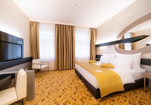 Habitación Doble Deluxe del hotel Grandium Prague. Foto 4