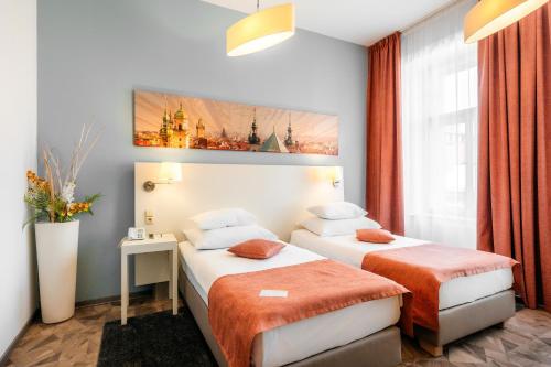 Habitación Doble Deluxe del hotel Grandium Prague. Foto 6