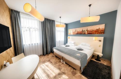 Habitación Doble Deluxe del hotel Grandium Prague. Foto 7