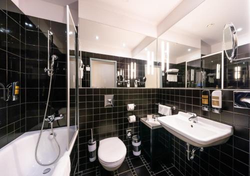 Habitación Doble Deluxe del hotel Grandium Prague. Foto 9