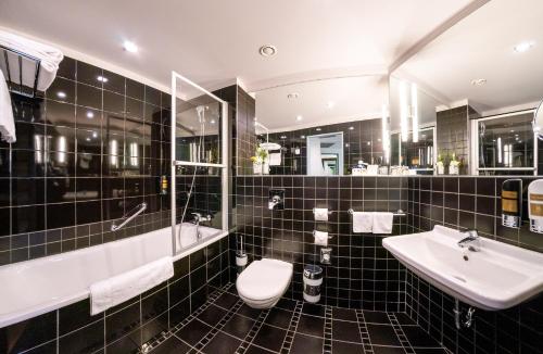 Habitación Doble Deluxe del hotel Grandium Prague. Foto 10