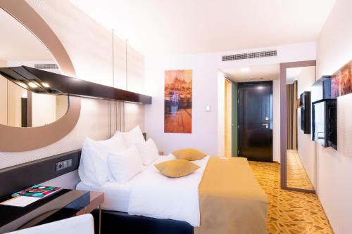 Habitación Individual del hotel Grandium Prague. Foto 5