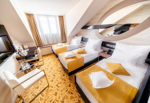 Habitación Triple del hotel Grandium Prague. Foto 2