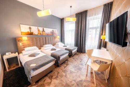 Habitación Triple del hotel Grandium Prague. Foto 4