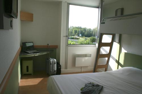 Habitación Triple del hotel Ibis Budget Thiers. Foto 2
