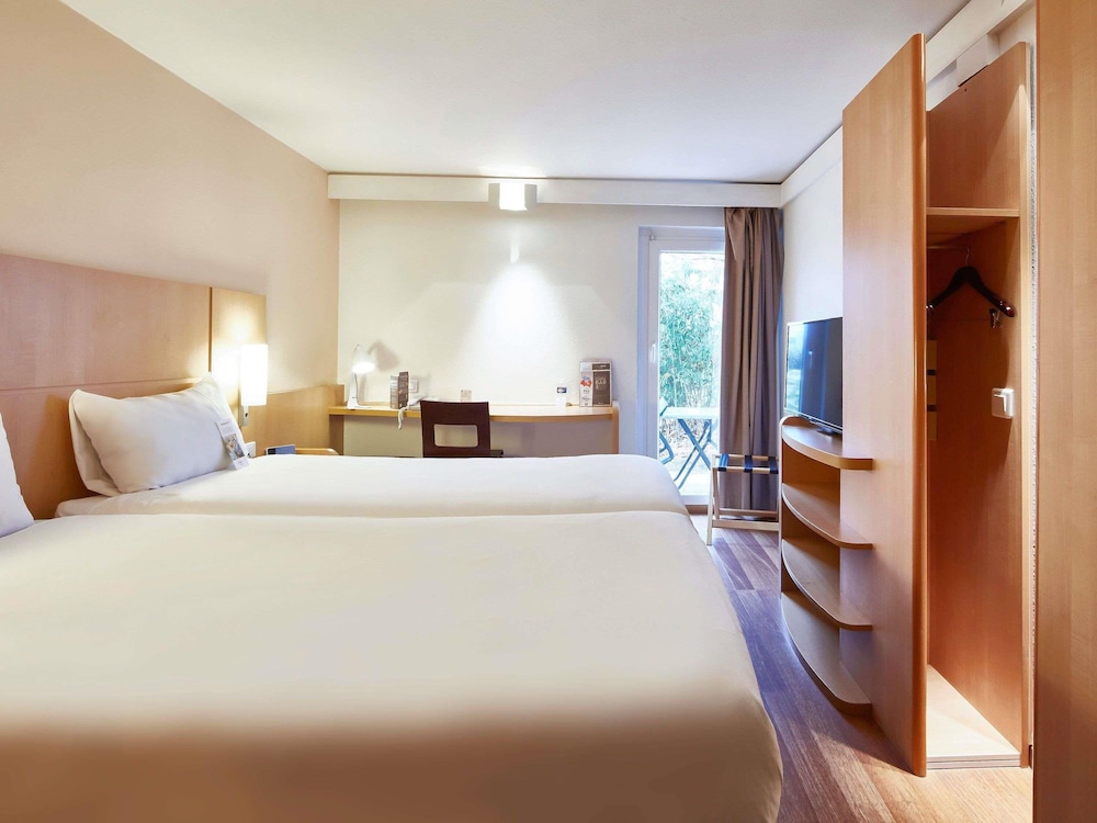 Habitación estándar con 2 camas individuales del hotel Ibis Haguenau Strasbourg Nord. Foto 8