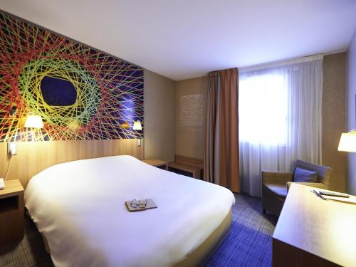 Habitación Doble Estándar del hotel Ibis Styles Cholet. Foto 7