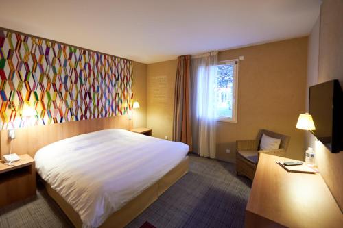 Habitación Doble Estándar del hotel Ibis Styles Cholet. Foto 12