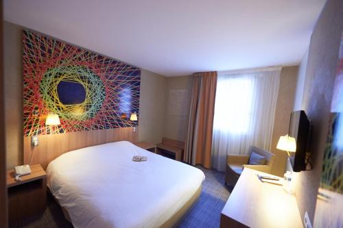 Habitación Doble Estándar del hotel Ibis Styles Cholet. Foto 13