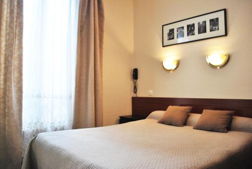 Habitación doble con baño privado del hotel Avenir Jonquière