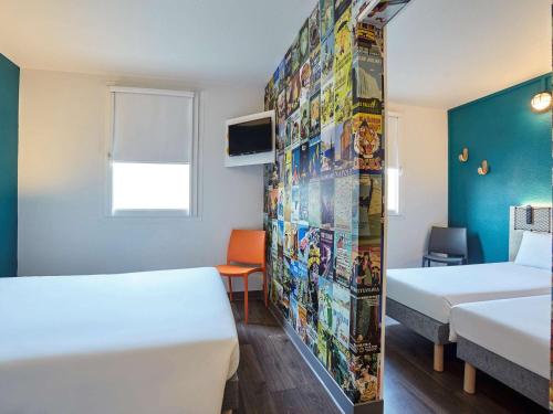 Habitación Familiar Cabrio con baño privado del hotel Hotelf1 Paris Porte De Châtillon. Foto 9