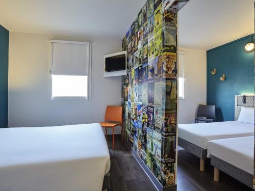 Habitación Familiar Cabrio con baño privado del hotel Hotelf1 Paris Porte De Châtillon. Foto 12