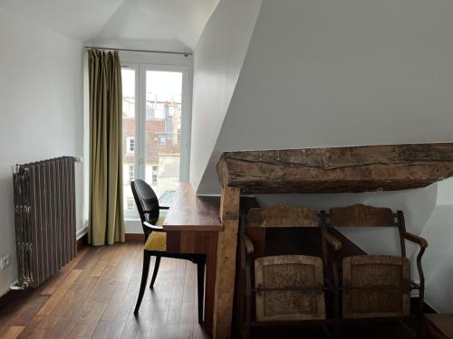 Suite Junior del hotel Boutique Hôtel De La Place Des Vosges. Foto 5