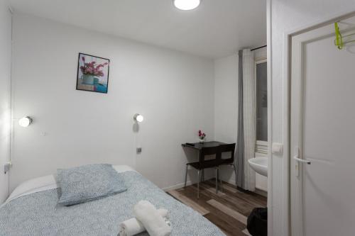 Habitación Doble del hotel De L'europe Belleville. Foto 22