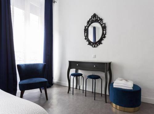 Habitación Triple del hotel De L'europe Belleville. Foto 1
