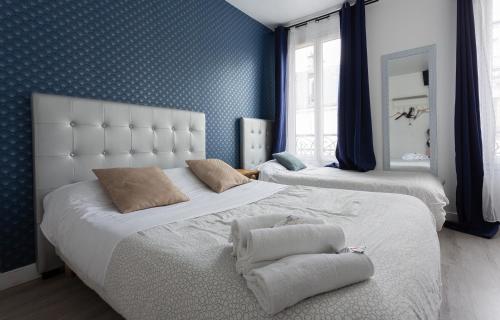 Habitación Triple del hotel De L'europe Belleville. Foto 13
