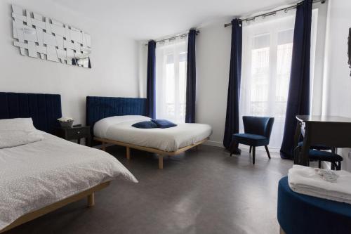 Habitación Triple del hotel De L'europe Belleville. Foto 19