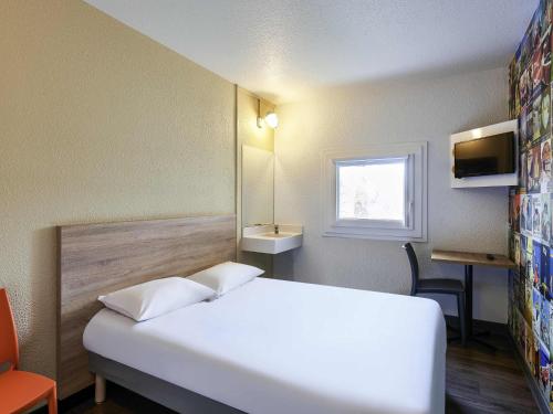 Habitación Tandem para un máximo de 2 viajeros. Los Básicos #ontheroad del hotel Hotelf1 Mulhouse Centre Ouest. Foto 2