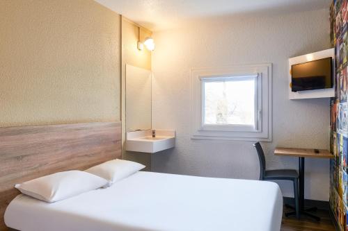 Habitación Tandem para un máximo de 2 viajeros. Los Básicos #ontheroad del hotel Hotelf1 Mulhouse Centre Ouest. Foto 10