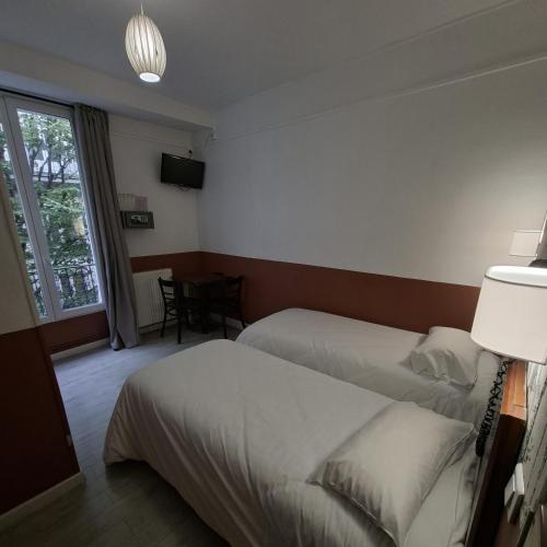 Habitación Doble con ducha - 2 camas del hotel Caulaincourt Montmartre By Hiphophostels. Foto 3