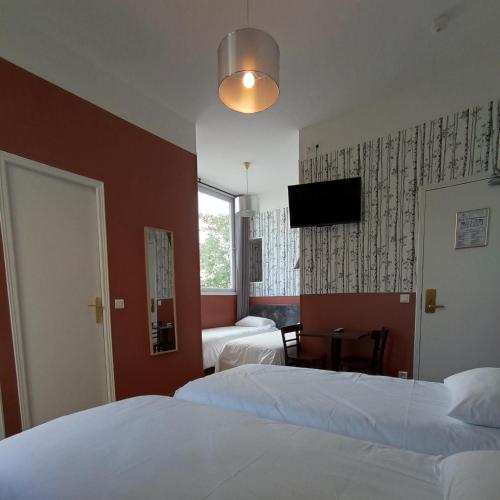 Habitación Cuádruple con baño privado del hotel Caulaincourt Montmartre By Hiphophostels. Foto 1