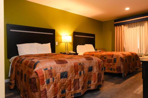 Habitación Doble adaptada para personas con movilidad reducida del hotel Capital Inn And Suites