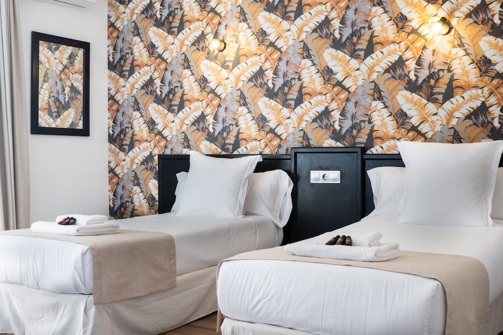 Habitación con 2 camas individuales del hotel Ventus. Foto 10